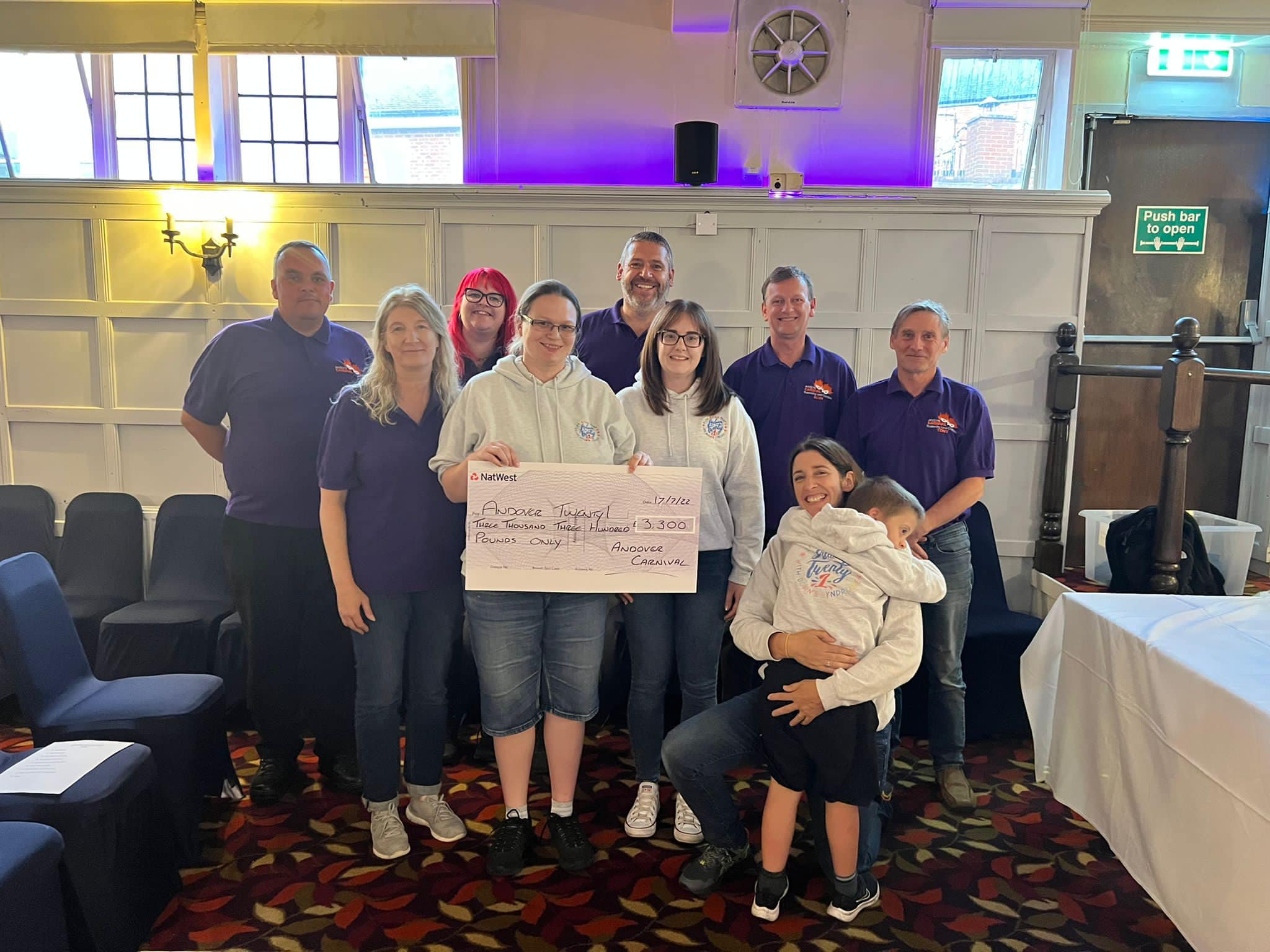 Carnival team serve up huge cheque for local charity