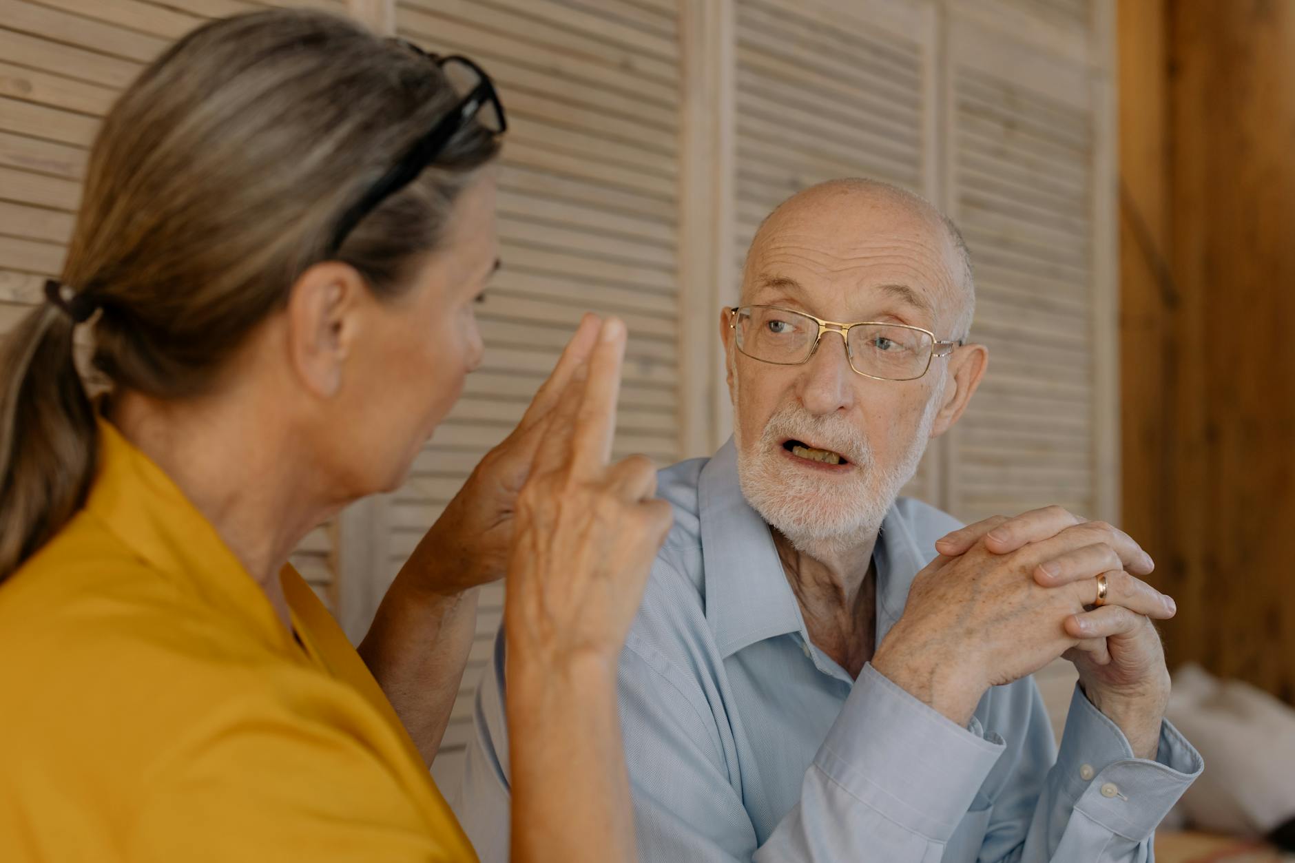 elderly people having a conversation